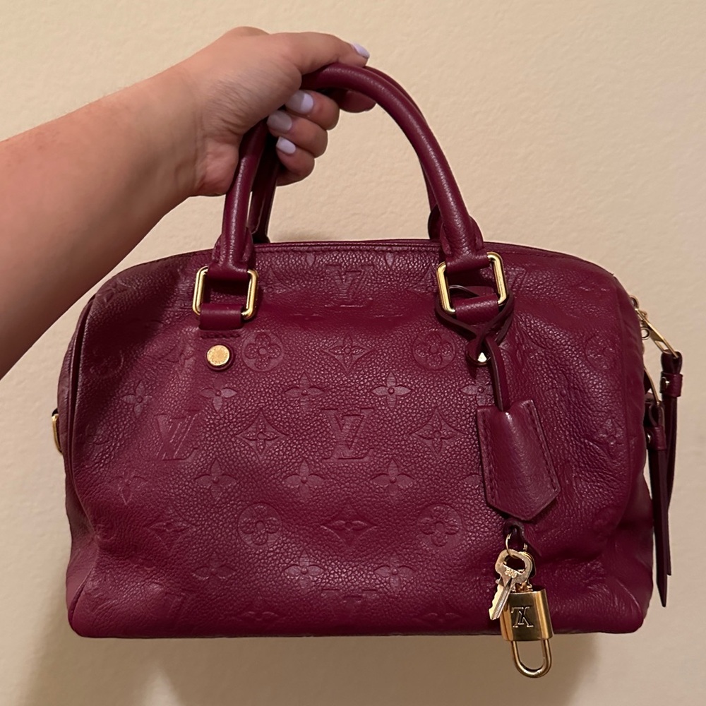 Louis Vuitton Empreinte Leather Speedy Bandouliere 25 in Aurore
